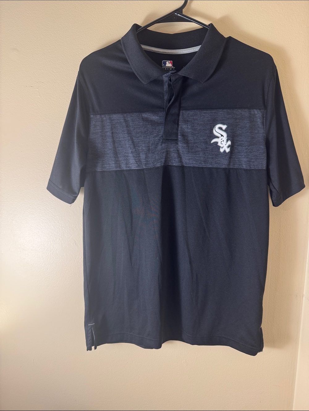 Genuine Merchandise Men’s Black Polo with Heathered Chest Panel